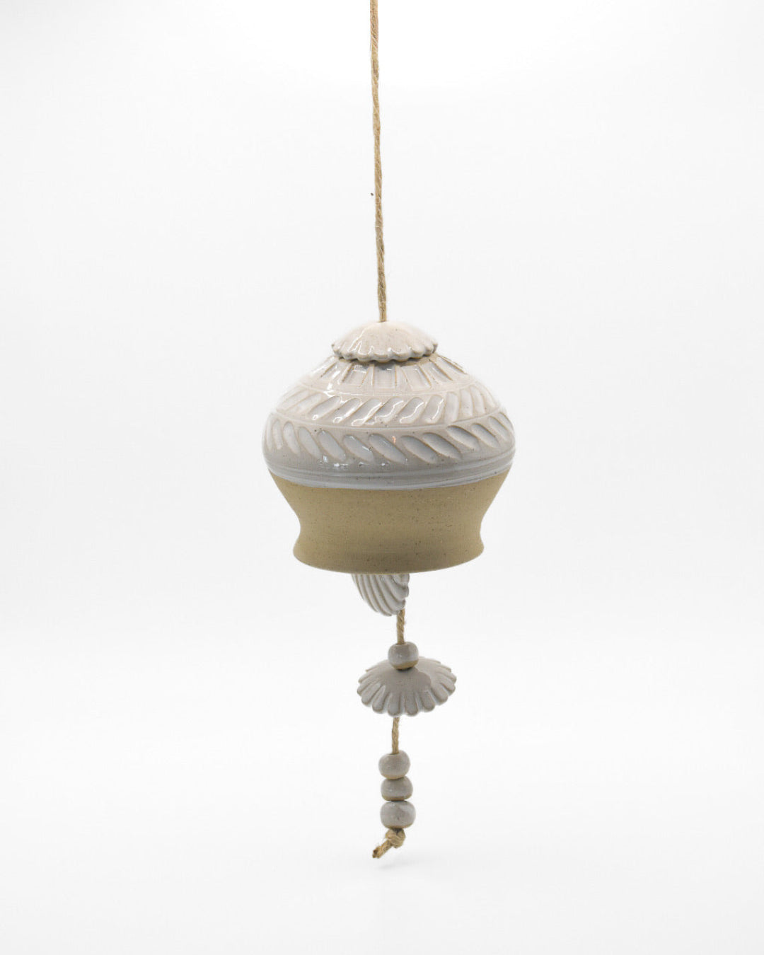 Decorative hanging shell with a white background