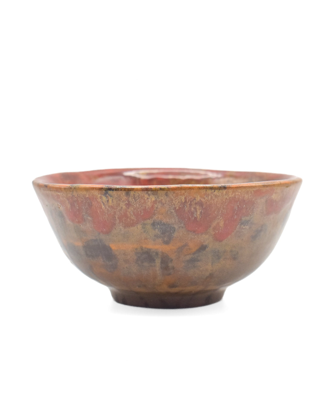 Ceramic bowl with a speckled design on a white background