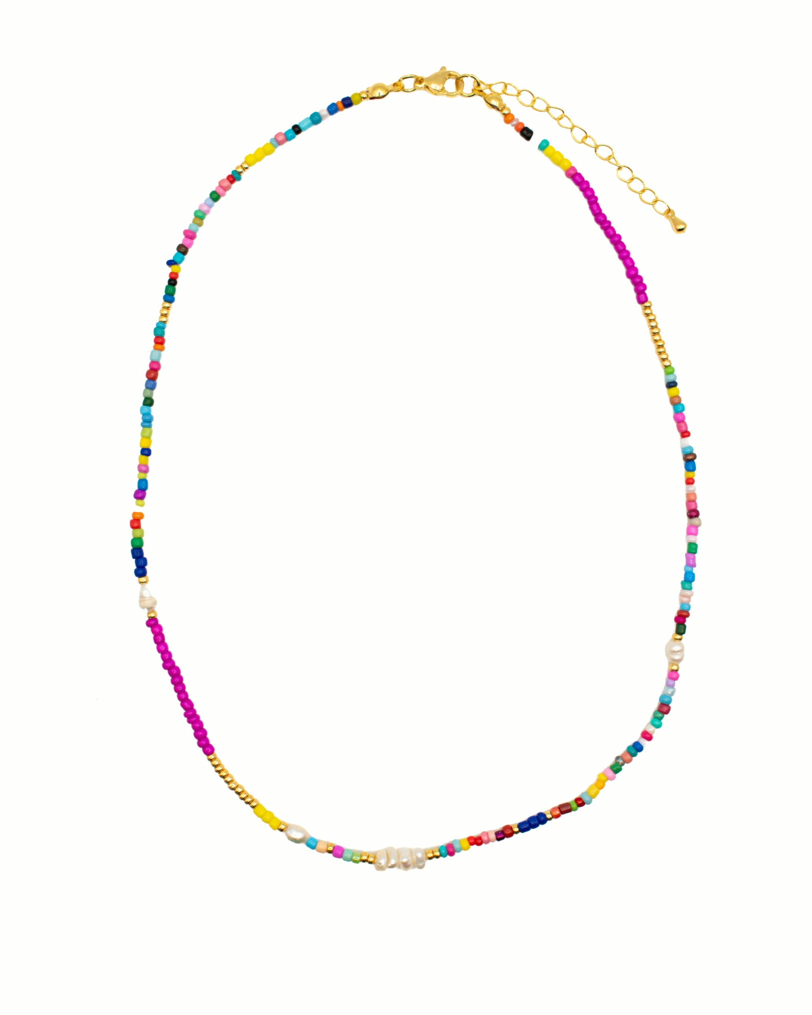 A delicate beaded necklace with a multicolor rainbow pattern, featuring small beads in various bright colors and white pearl-like accents, with a gold-tone clasp and extender chain, shown on a plain white background.