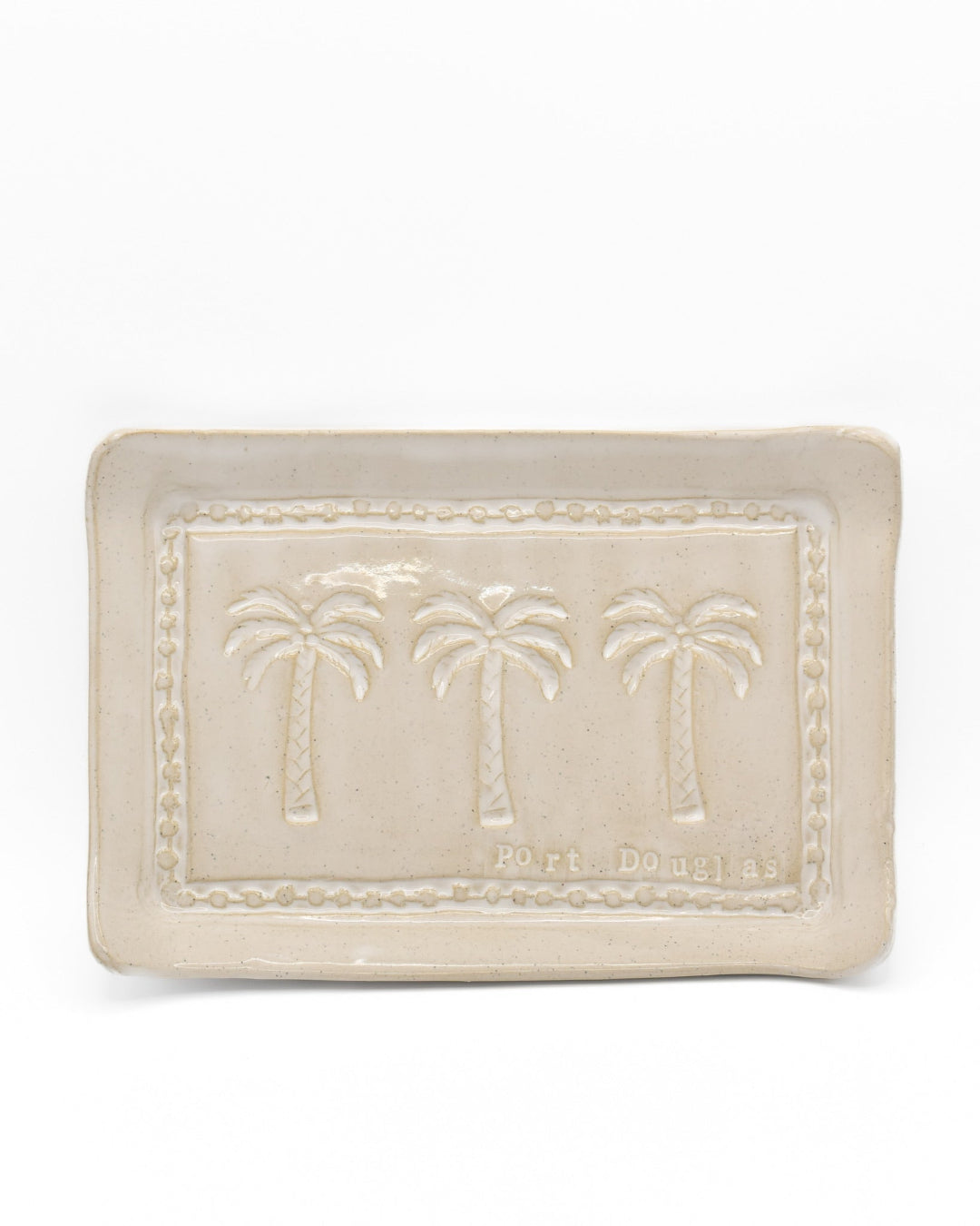 Rectangular ceramic dish with embossed palm tree design on a white background