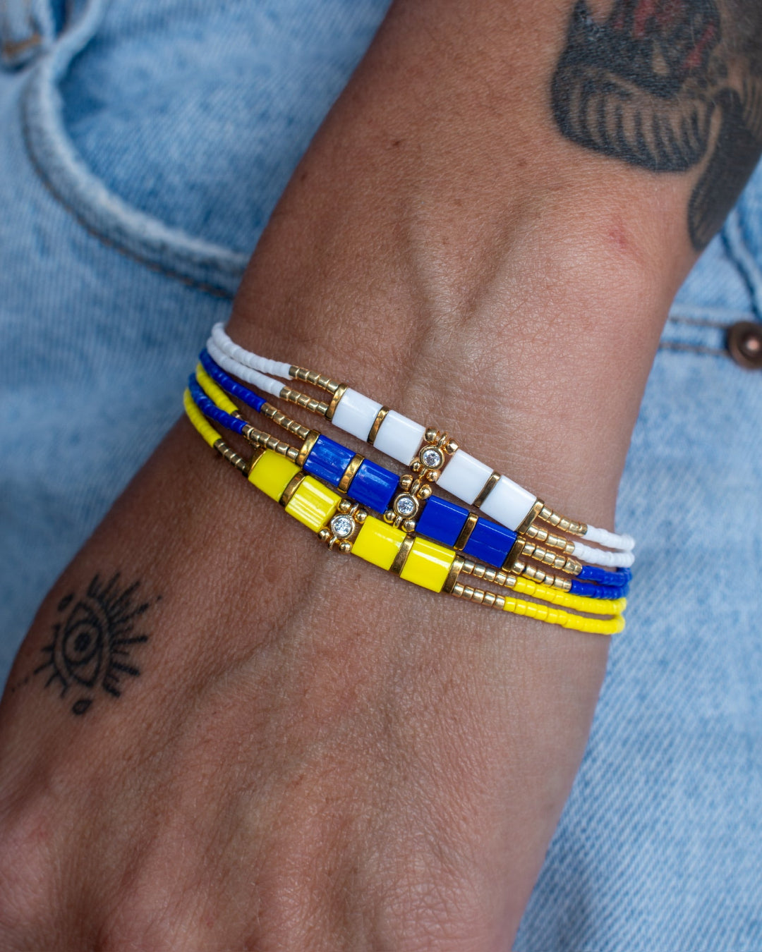 stacked colourful bracelets