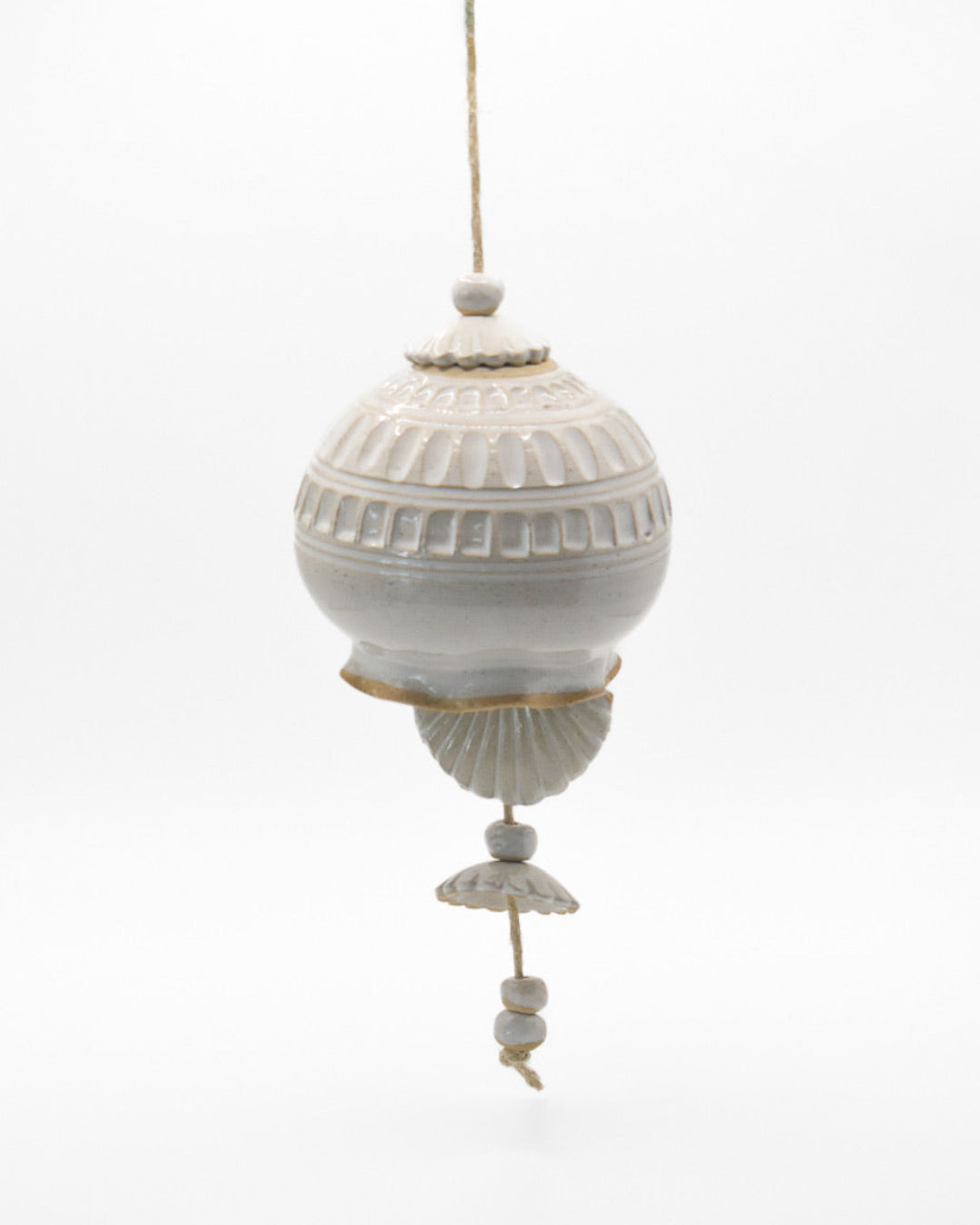 Decorative hanging ball with textured design on a white background